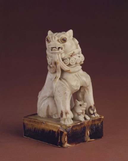 Xing kiln white glaze pointillist lioness statue, The Palace Museum