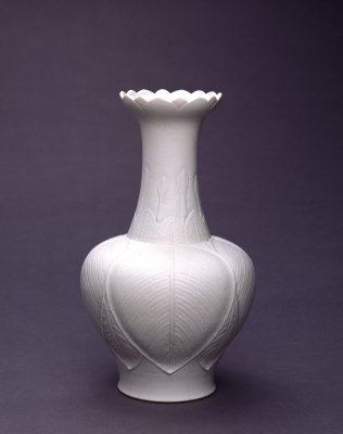 Qianlong period white glaze embossed lotus petal mouth bottle, The Palace Museum