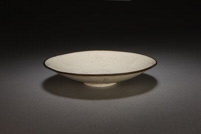 Ding kiln white glaze plate with lotus and lotus pattern, The Palace Museum