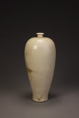 Ding kiln white glaze plum vase with carved lotus pattern, The Palace Museum