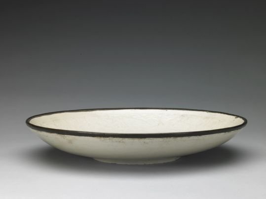 Ding kiln white glaze printed peacock and peony plate, The Palace Museum