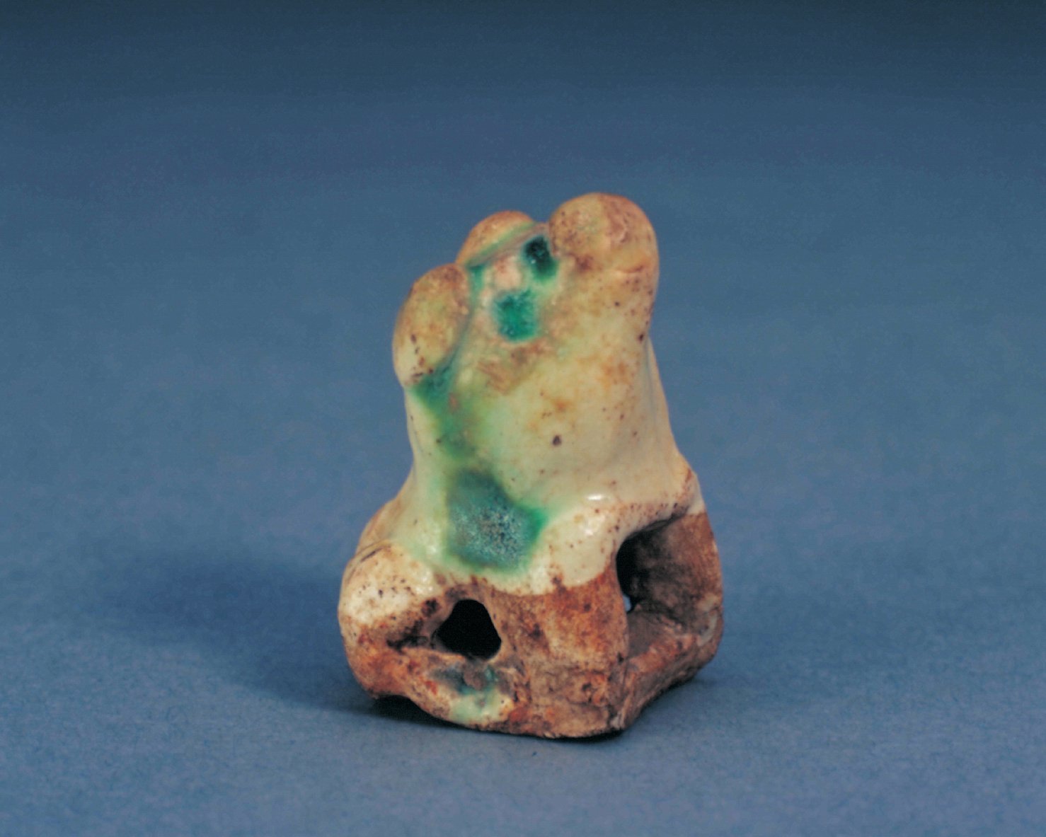 Cizhou kiln white glaze green colored dog, The Palace Museum