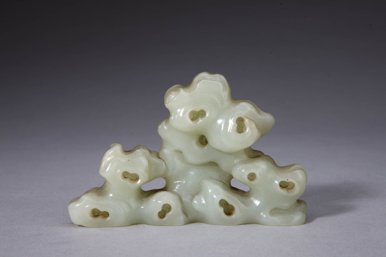 Qingyu mountain stone shaped pen stand, The Palace Museum