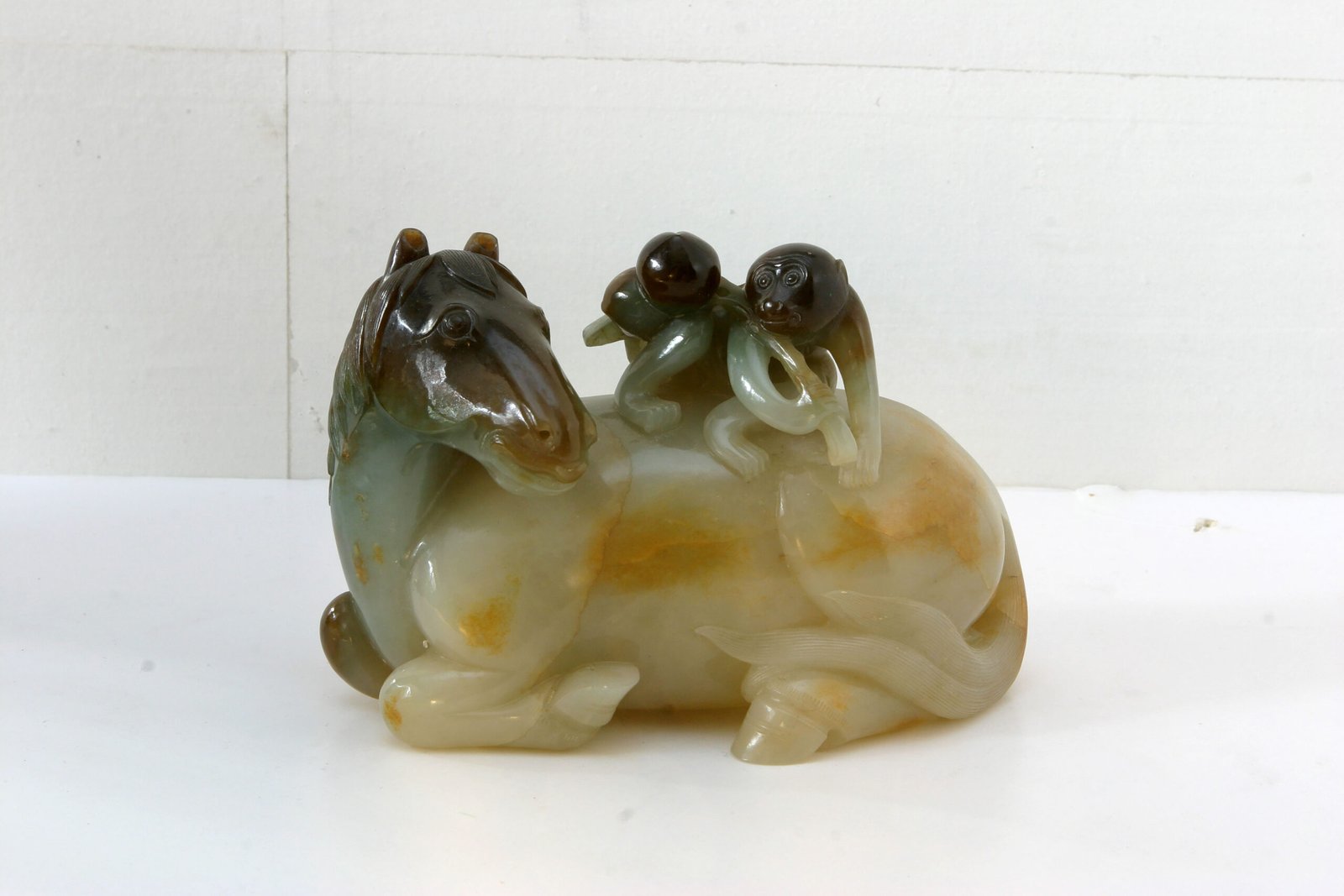Sapphire negative ape lying on horse, The Palace Museum